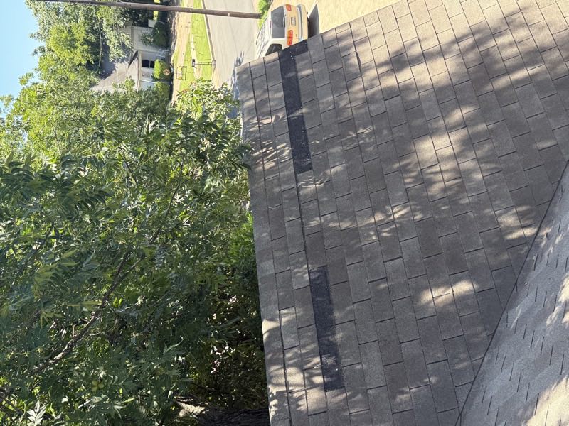Missing shingles exposing the course below