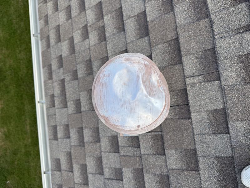 Solar tube dome set into the shingle field