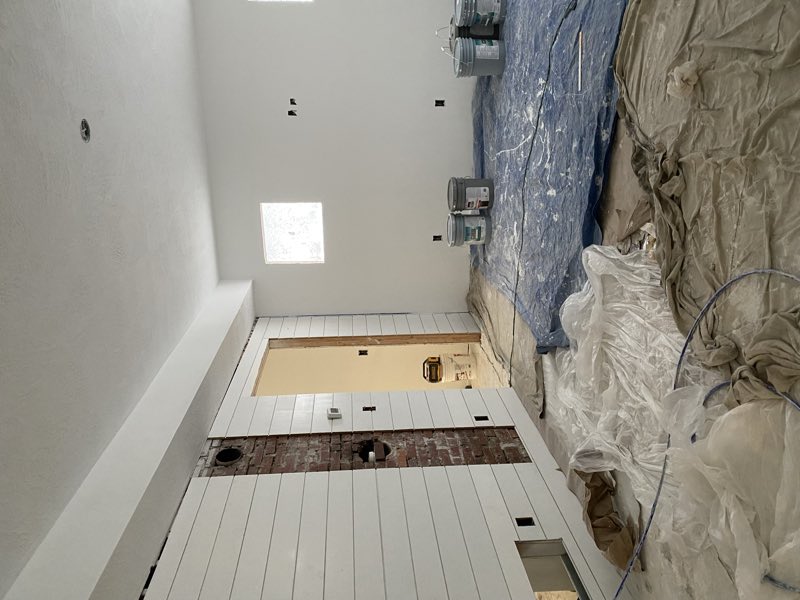 Room masked and sheeted before paint